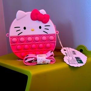 A Hello Kitty pop it purse